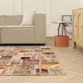 6x9 ft vintage Turkish patchwork area rug with vibrant geometric patterns in wool and cotton in a modern living room.