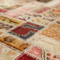 Handmade 6x9 ft vintage Turkish patchwork rug featuring colorful geometric patterns in wool and cotton.