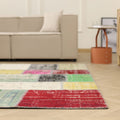 6x9 ft vintage Turkish patchwork area rug in vibrant mix-colors, crafted from distressed wool and cotton in a boho style.
