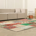 6x9 ft vintage Turkish patchwork area rug featuring vibrant floral patterns in wool and cotton on a light wood floor.