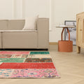 6x9 ft vintage Turkish patchwork area rug featuring vibrant floral wool and cotton patterns in a bohemian living room.