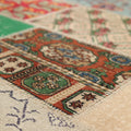 Handmade 6x9 ft vintage Turkish patchwork rug featuring vibrant floral patterns in wool and cotton.