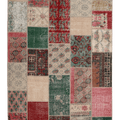 6x9 ft vintage Turkish patchwork area rug featuring vibrant floral patterns in wool and cotton with eclectic colors.