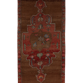 A traditional Persian-style runner rug with a central medallion design in shades of brown, red, and black, shown flat against a white background.