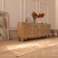 Vintage 2x11 ft handmade Turkish runner rug in beige and red with geometric patterns on a herringbone wood floor.