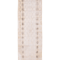 Hand-woven vintage Isparta runner rug in beige and white with geometric patterns, crafted from wool and cotton.