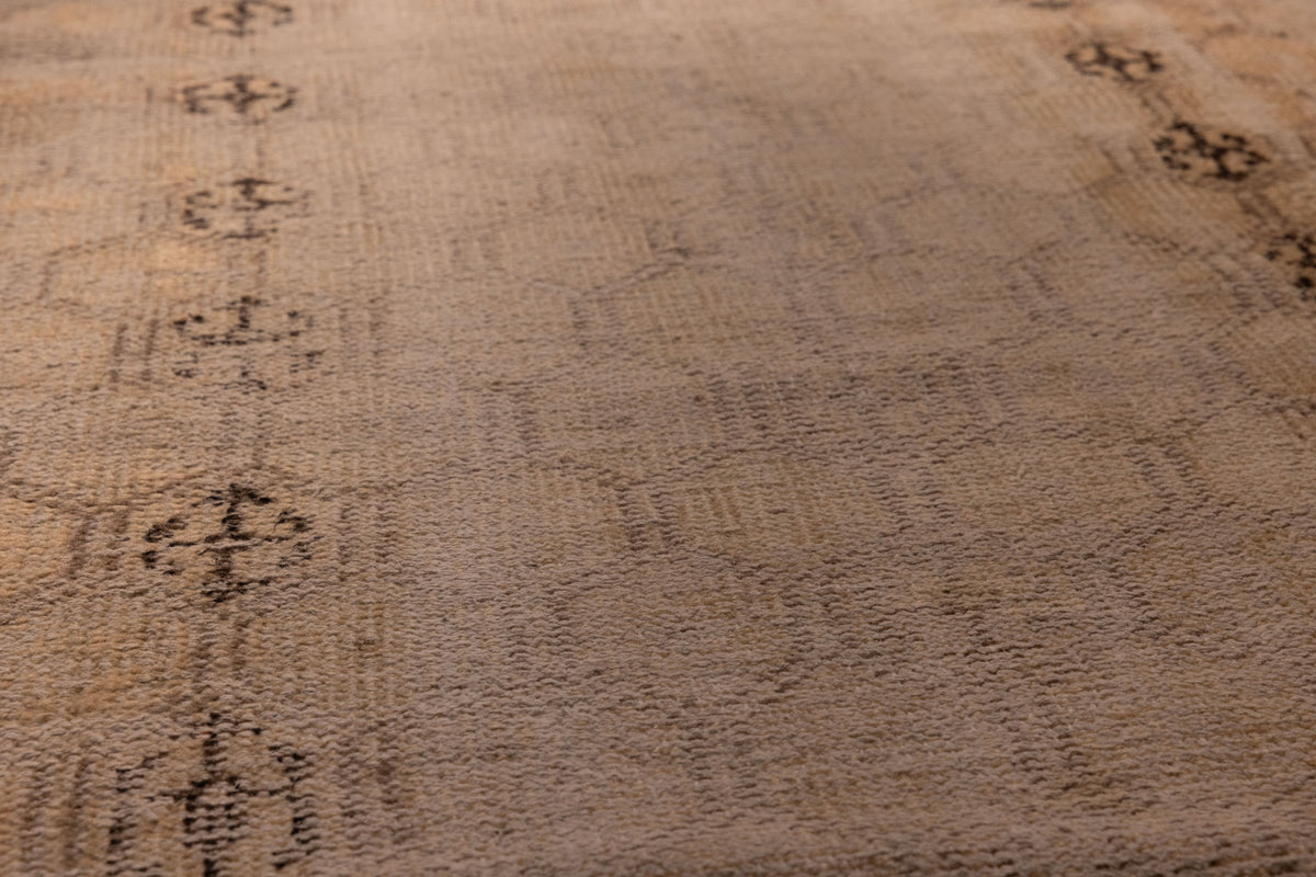 Hand-woven vintage Isparta runner rug in beige wool and cotton with soft geometric patterns and a low-pile texture.