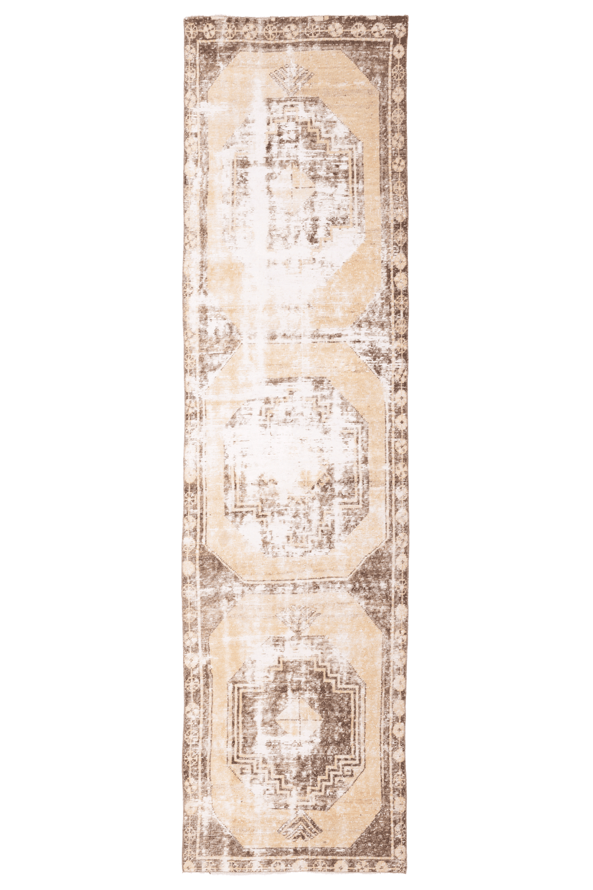 Vintage 2x10 ft Turkish runner rug in beige and brown wool with geometric patterns and a distressed farmhouse style.