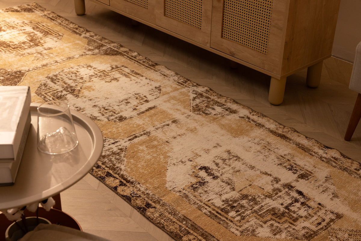Vintage 2x10 ft Turkish runner rug in beige and brown with geometric patterns, handmade from wool and cotton.