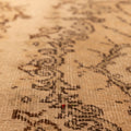 Hand-woven vintage Isparta rug in beige and white with detailed floral patterns and a soft, low-pile wool and cotton texture.