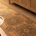 Hand-woven vintage Konya runner rug in beige and brown with geometric patterns, 3x11 ft wool and cotton blend.