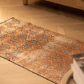 Hand-woven vintage Isparta Turkish area rug in burnt orange with floral patterns, 2x4 ft wool and cotton blend.