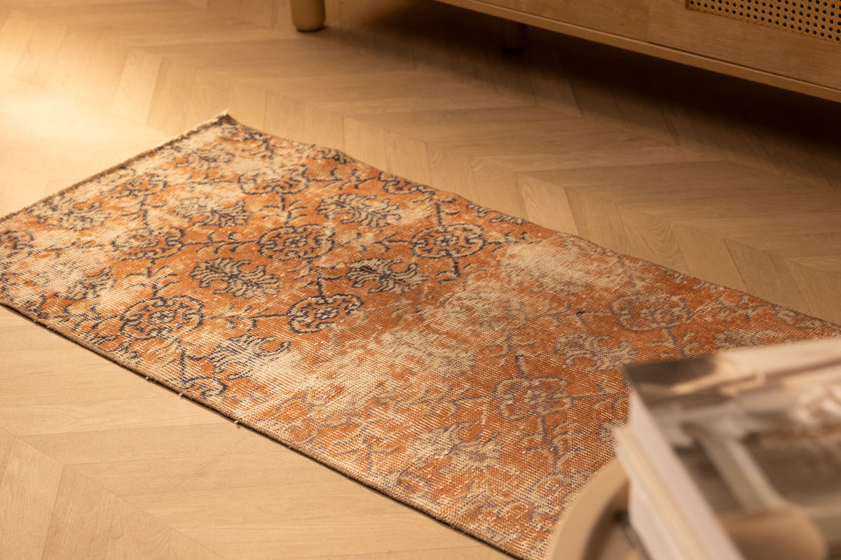 Hand-woven vintage Isparta Turkish area rug in burnt orange with floral patterns, 2x4 ft wool and cotton blend.