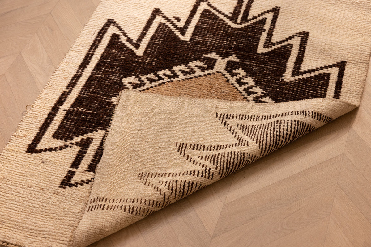 Handmade white and brown wool-cotton runner rug with geometric farmhouse patterns, 2.9 x 10.8 ft.