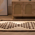 Handmade white and brown wool-cotton Persian-style runner rug with geometric patterns in a farmhouse interior.