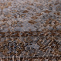 Vintage navy overdyed Turkish runner rug with intricate floral patterns and a soft wool-cotton blend texture.