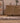Handmade gray and brown Persian-style wool and cotton kilim runner with geometric patterns on a wooden floor.