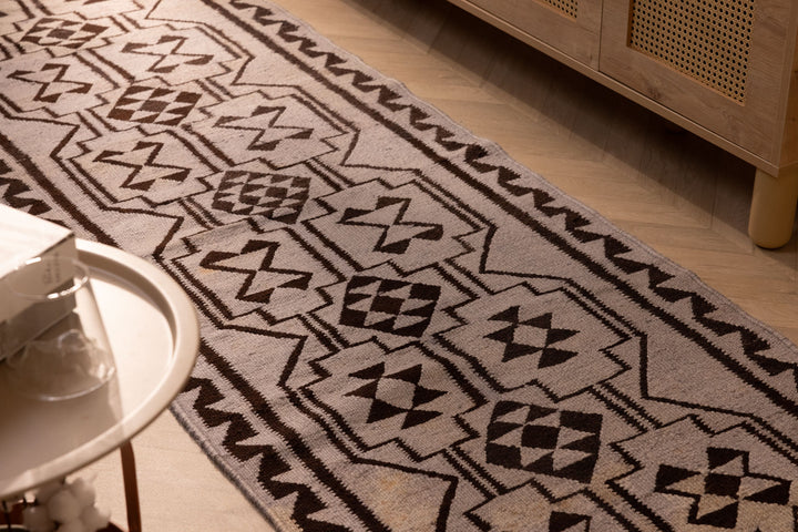 Handmade gray and brown geometric Persian-style wool and cotton kilim runner rug.