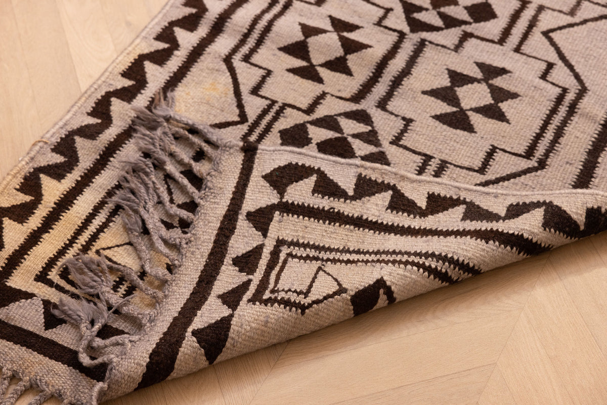 Handmade gray and brown wool-cotton kilim runner with geometric patterns and fringe, 3x11 ft farmhouse style rug.