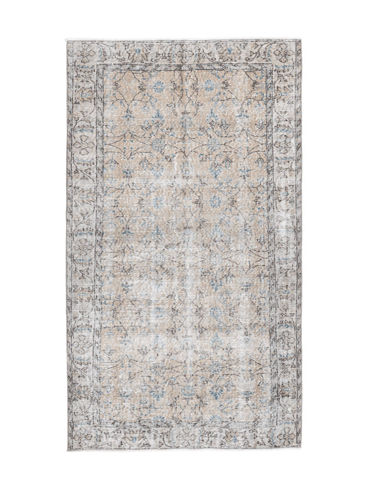 Hand-woven 3x7 ft vintage Isparta rug in burnt orange and neutral tones with intricate floral patterns and wool-cotton blend.
