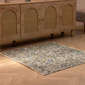 Hand-woven 3x4 ft vintage Isparta wool and cotton rug in gray and navy with a bohemian floral pattern.