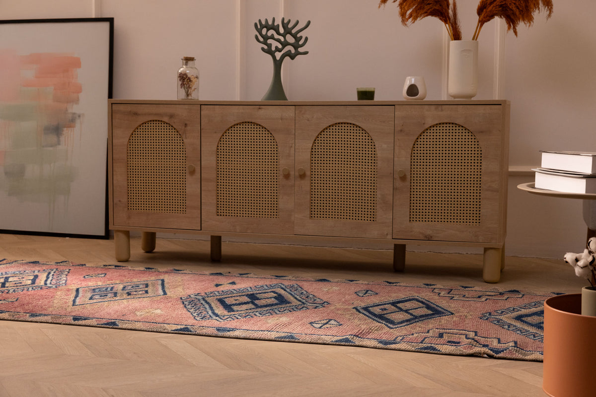 Handmade 3.5x9.9 ft wool and cotton Persian-style runner rug in pink and navy with geometric bohemian patterns.