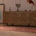 Handmade pink Persian-style wool and cotton runner rug with geometric southwestern patterns in a bohemian living room.