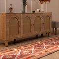 2.9x14 ft handmade wool and cotton Persian-style Kilim runner in brown and orange with geometric maximalist patterns.