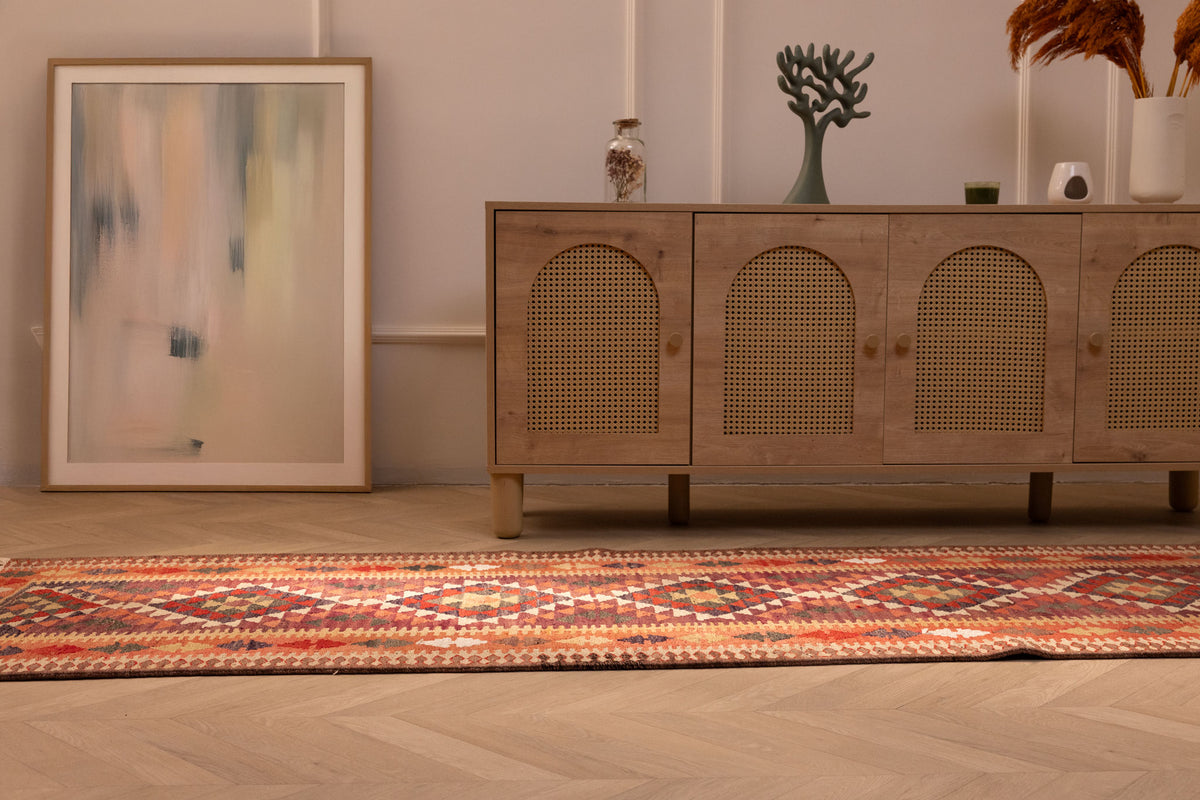 Handmade 2.9x14 ft wool and cotton Persian-style kilim runner in brown and orange with geometric patterns.