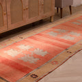 Vintage 3.7x10.9 ft handmade Sivas wool runner rug in burnt orange with floral patterns and minimalist brown accents.
