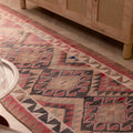 Handmade 3.3x11.7 ft wool and cotton Persian-style runner rug with pink and gray geometric bohemian patterns.