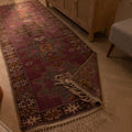 Handmade vintage Turkish runner rug in pink and brown with geometric patterns, crafted from wool and cotton, 3x10 ft.