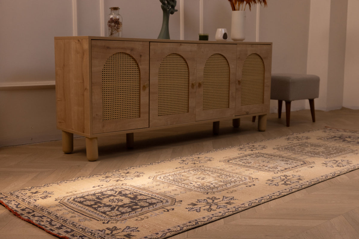Vintage beige Konya runner rug with geometric patterns, hand-woven from wool and cotton, displayed in a farmhouse hallway.