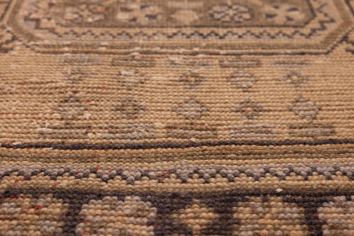 Hand-woven vintage Konya runner rug in beige with geometric patterns, crafted from wool and cotton with a low pile texture.