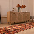 Handmade 2.7x13.3 ft wool and cotton runner rug featuring a bohemian geometric pattern in brown and orange tones.