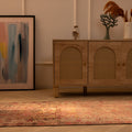 Handmade 2.7x10.9 ft wool and cotton Persian-style runner rug in brown and beige with a maximalist floral bohemian pattern.