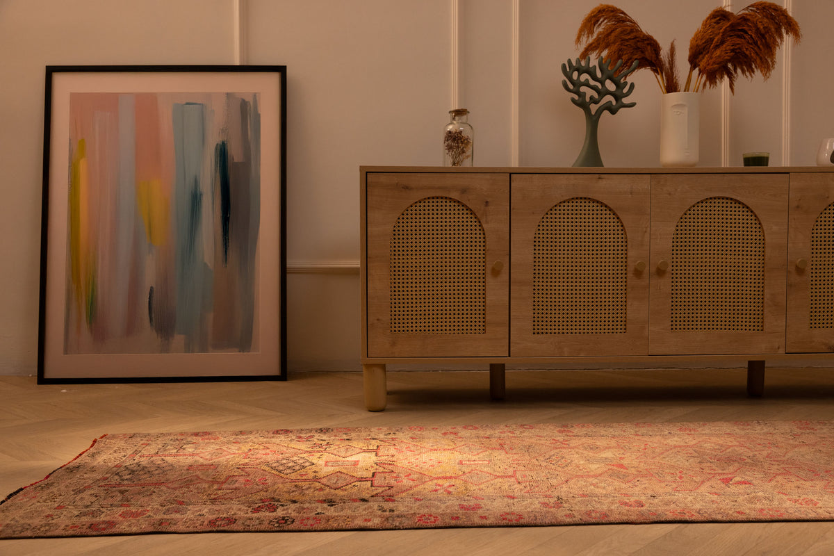 Handmade 2.7x10.9 ft wool and cotton Persian-style runner rug in brown and beige with a maximalist floral bohemian pattern.