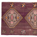 Decorative rug with geometric pattern on a white background