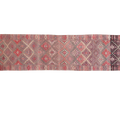 Woven textile with geometric pattern on a white background