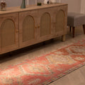 Handmade 2.6x12.4 ft Persian-style runner rug in pink and brown wool-cotton blend with geometric bohemian patterns.