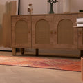 Handmade orange Persian-style runner rug with floral patterns, crafted from wool and cotton in a bohemian design.