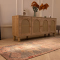 Handmade 2.9x10.2 ft wool and cotton Persian-style runner rug in pink and brown with geometric patterns.