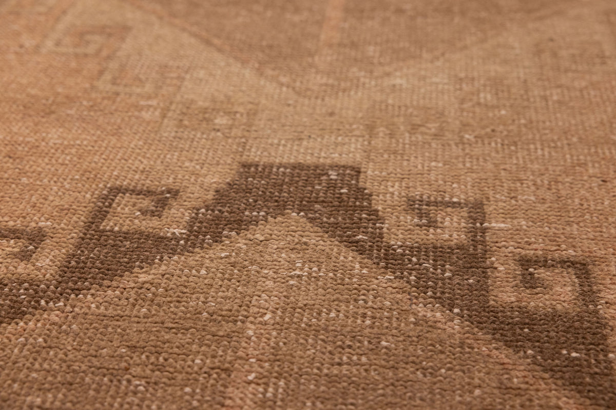 Vintage Malatya Turkish runner rug in wool and cotton with orange and brown geometric patterns.
