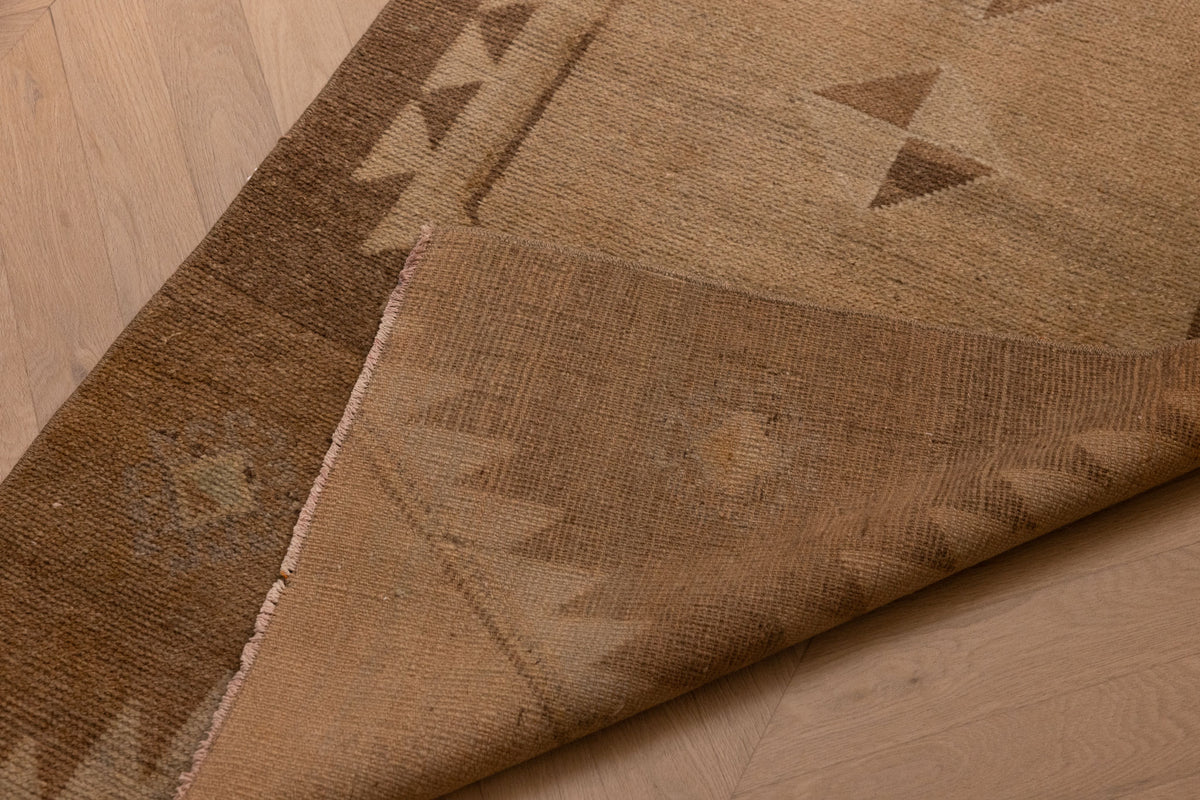 Handwoven brown and beige geometric Turkish wool runner rug, 2x8 ft vintage farmhouse style.