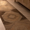 Handwoven vintage Turkish runner rug in beige and brown with geometric patterns, 2x9 ft wool and cotton blend.