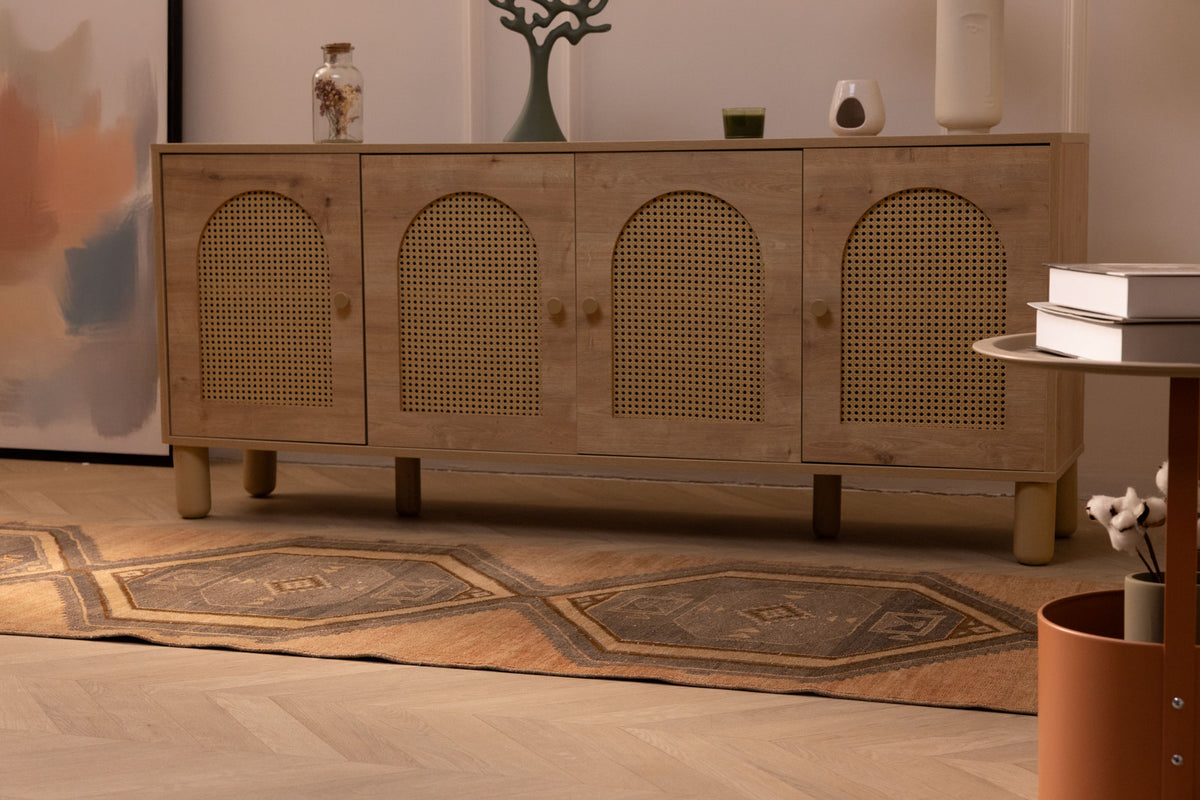 Handwoven 3x12 ft vintage Turkish runner rug in burnt orange and gray with geometric patterns on a wooden floor.