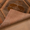 Handwoven 3x12 ft vintage Turkish runner rug in orange and gray with geometric patterns and wool-cotton blend.