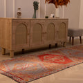 Handmade 3.4x10.3 ft Persian style runner rug in orange and brown wool-cotton blend with geometric bohemian patterns.