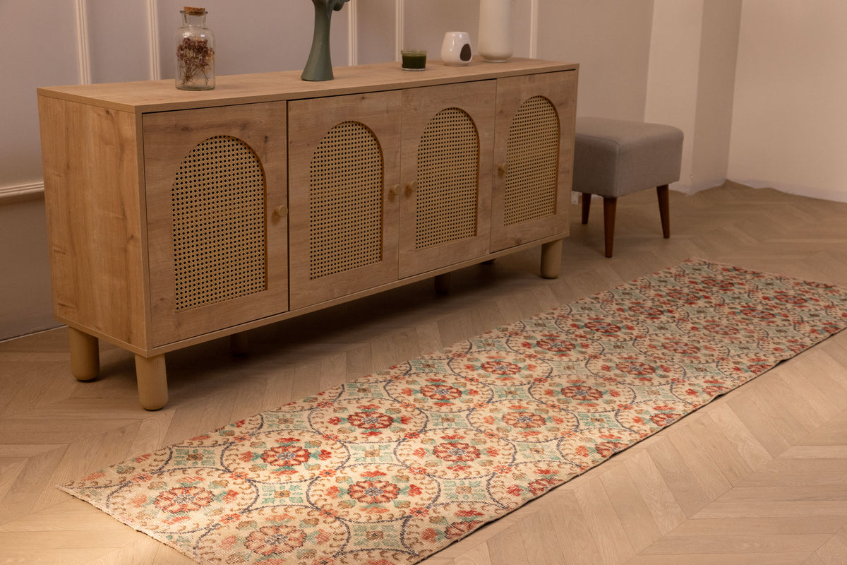 Vintage Isparta Turkish runner rug in beige and green floral wool, 2x8 ft, featuring bohemian maximalist patterns.