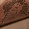 Handwoven vintage Turkish runner rug in brown and orange with geometric patterns, 3x11 ft wool and cotton blend.